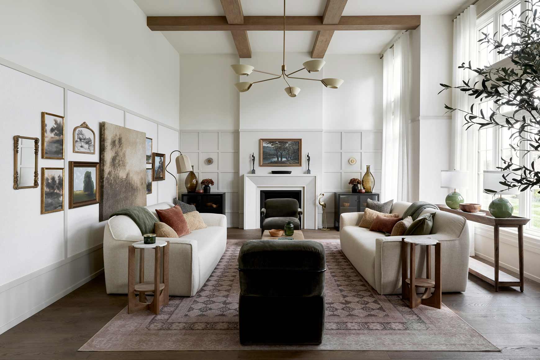 Two-storey great room with coffered wood beams in an Eversley Estates home
