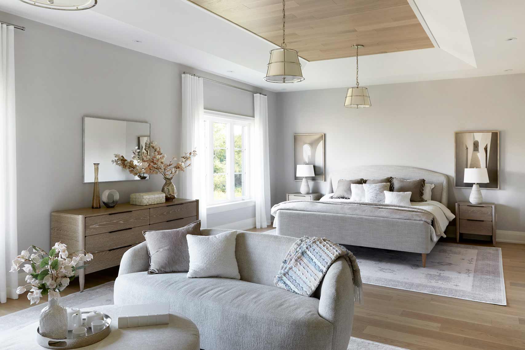 Primary bedroom suite with tray ceiling in a Worthington estate home