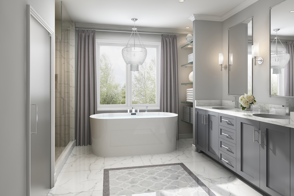 Primary ensuite with freestanding soaker tub and glass shower