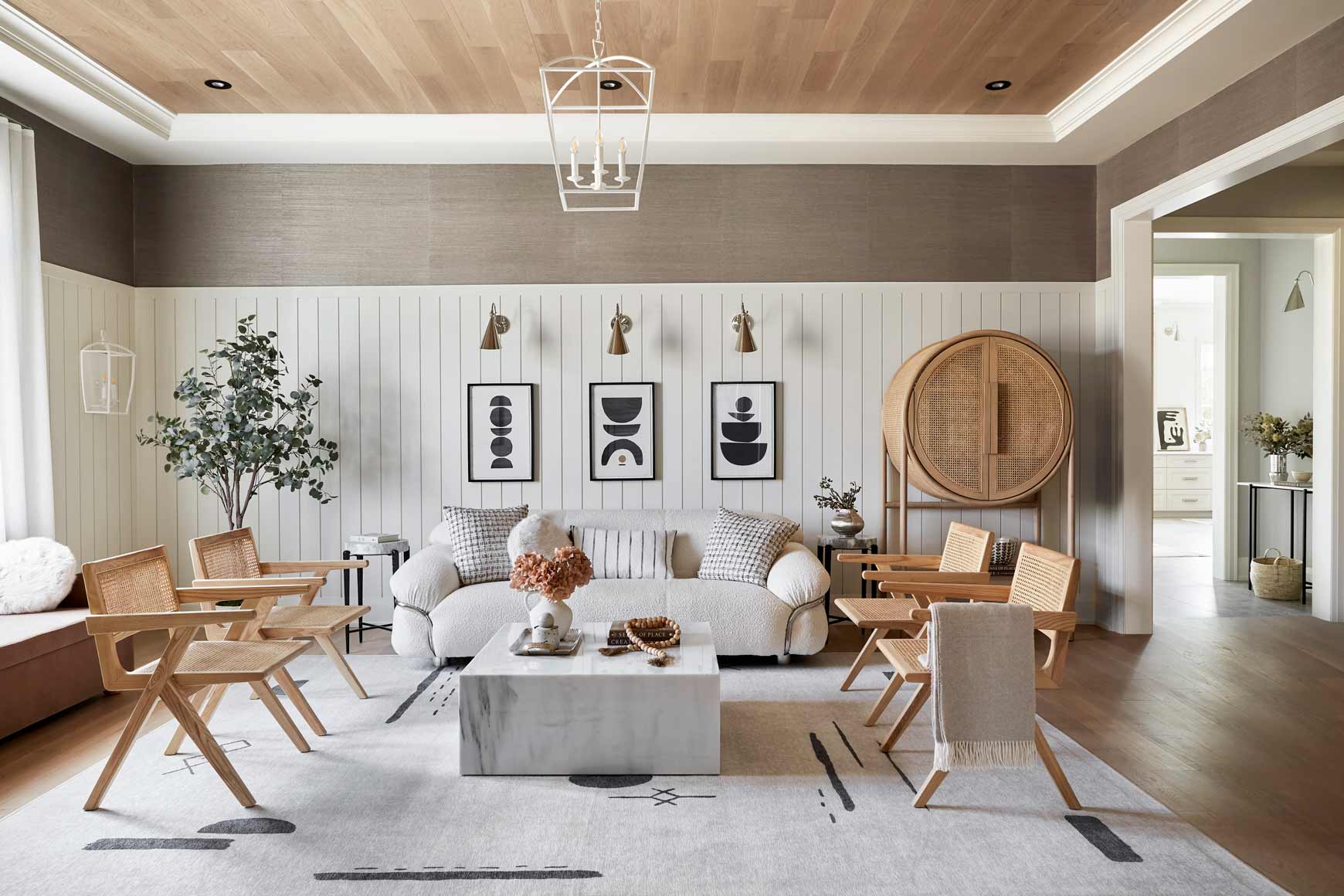 Panelled living room with wood ceiling in a Worthington estate home at Eversley Estates